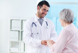 doctor talking with patient